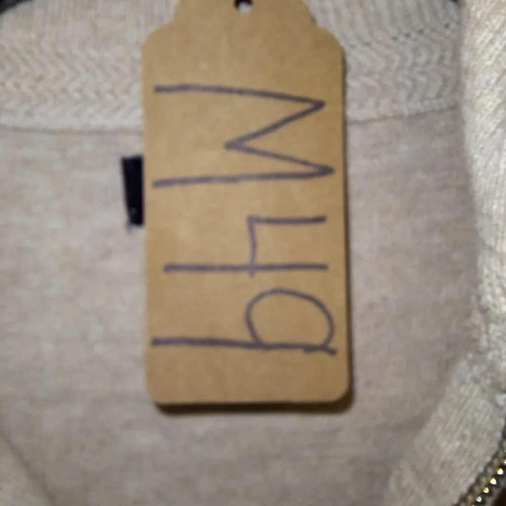 A J.Crew 100% cotton turtleneck sweater in a men's size large. EUC.